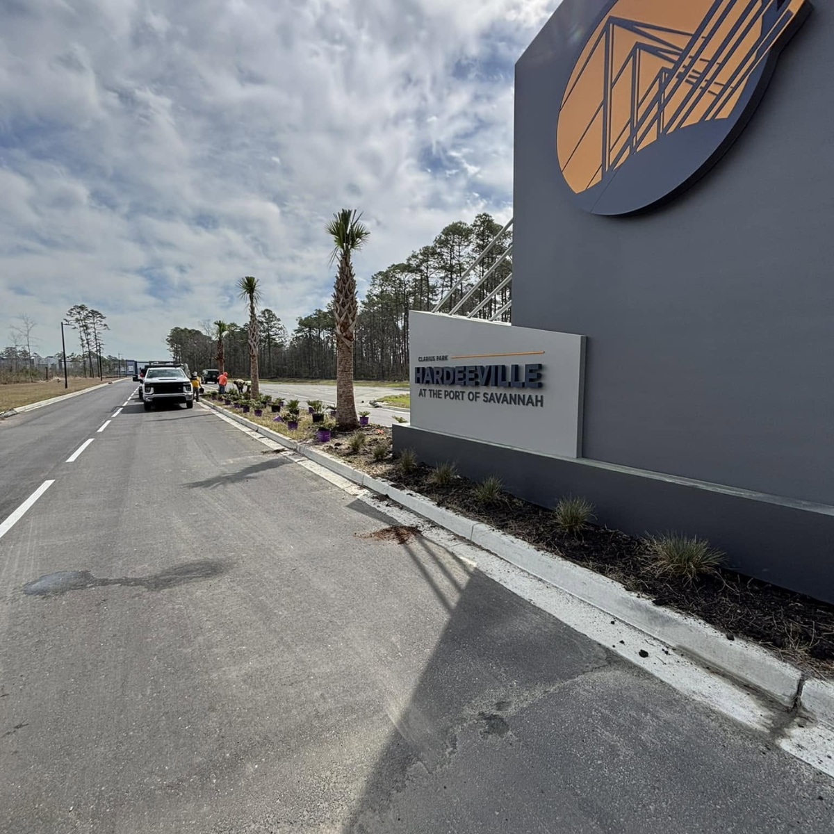 The Groundsmen completing commercial landscape installation and entrance landscaping at an industrial development near the Port of Savannah.